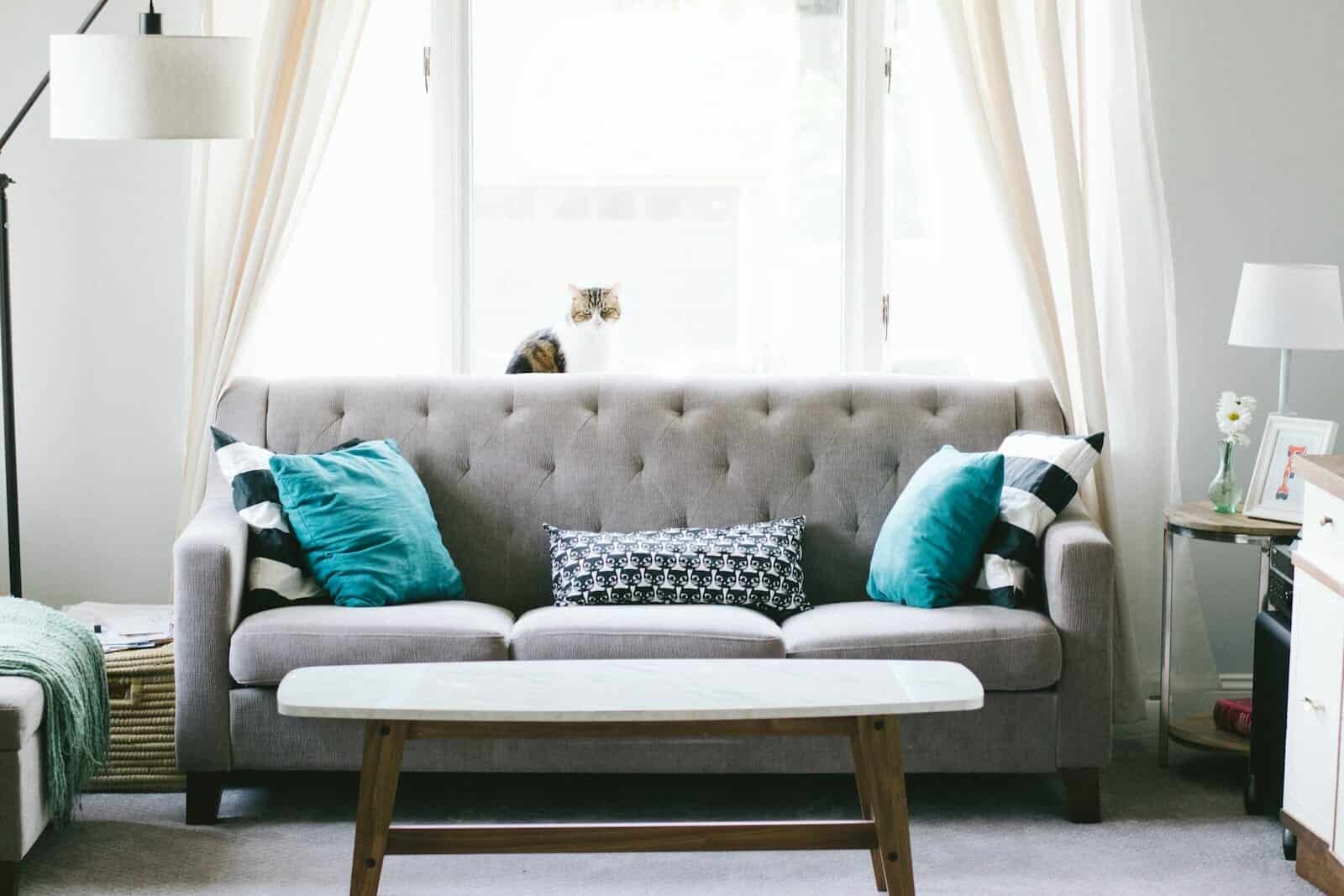 fbxuxp57em0 brown and white wooden table beside sofa chair
